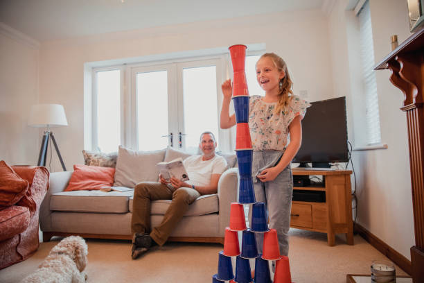 fun-in-the-living-room-picture-id916075412?k=20&m=916075412&s=612x612&w=0&h=g3w9N6FLk0xVuDEL8w0-ro1AQPfIHF-6_vnfJe0IUB4=